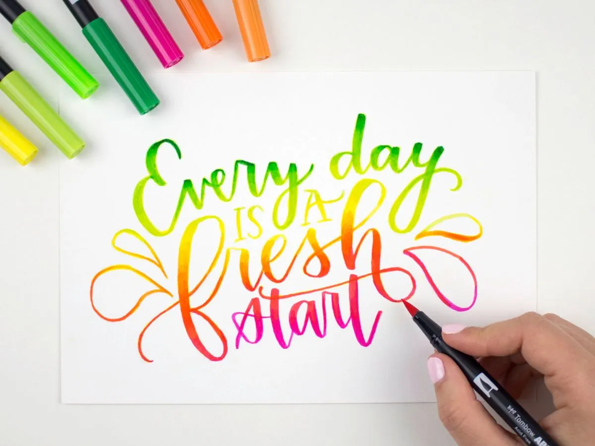 Contoh karya hand lattering menggunakan brush pen tombow ABT, hasil teks gradasi bertuliskan “every day is a fresh start”.