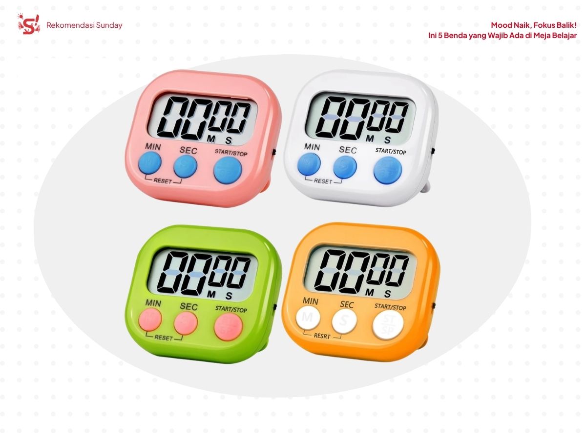Empat Timer merek Joyko berwarna pink, putih, hijau dan orange sebagai perlengkapan wajib di meja belajar